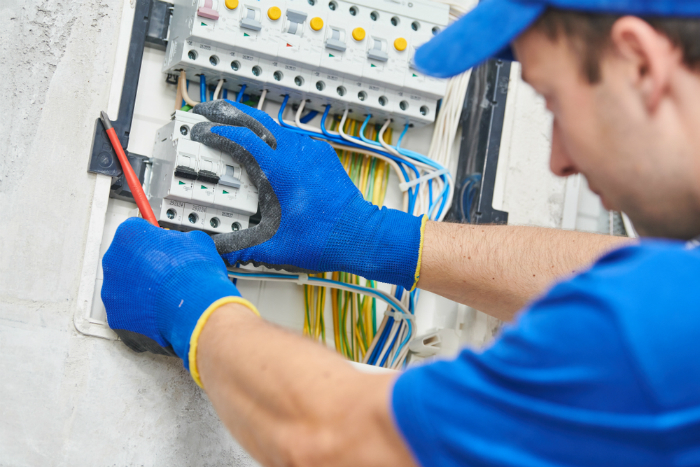 local electrician installing switchboard